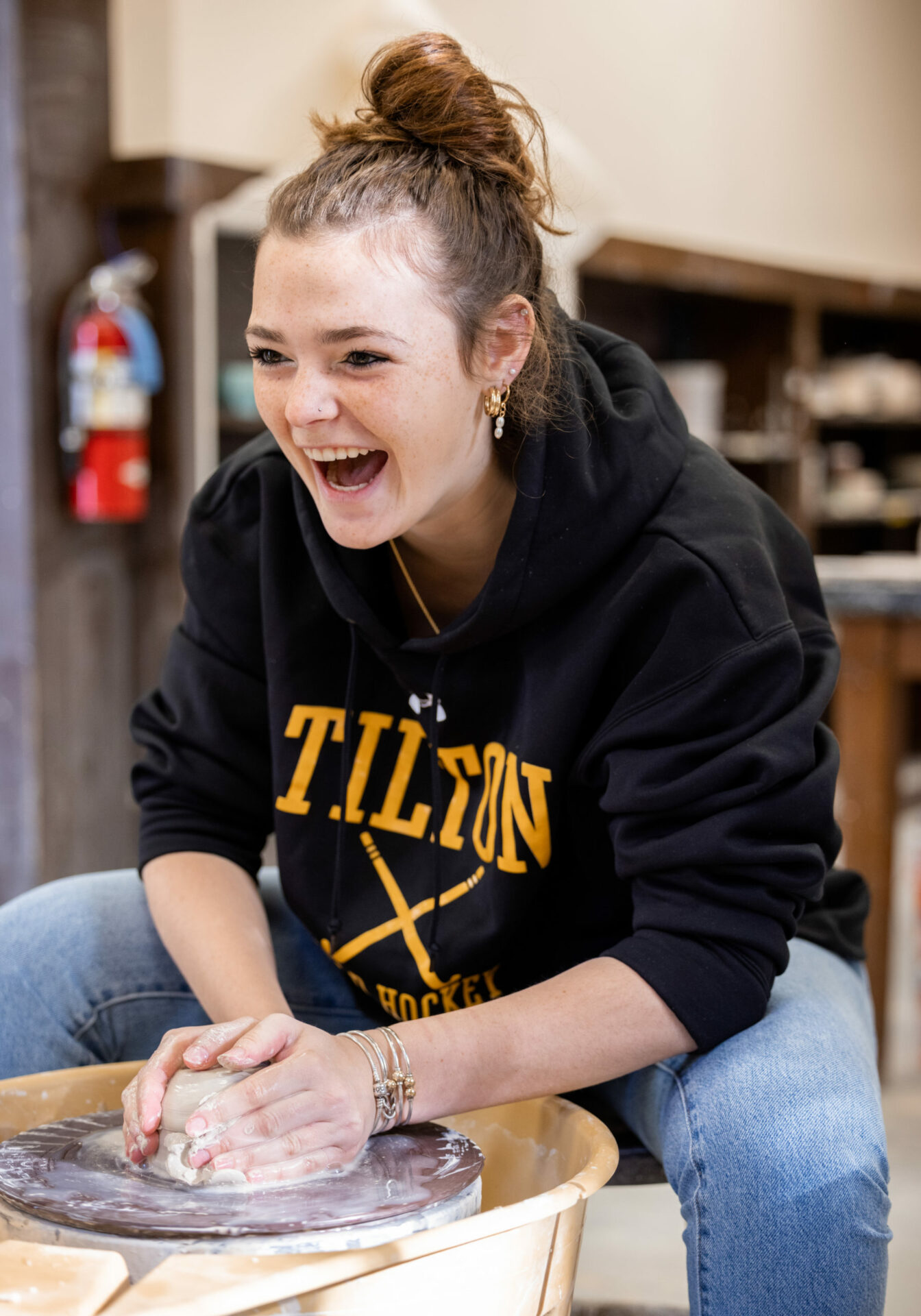 A student participates in a ceramics class as part of Tilton's New Hampshire Boarding School academic program.