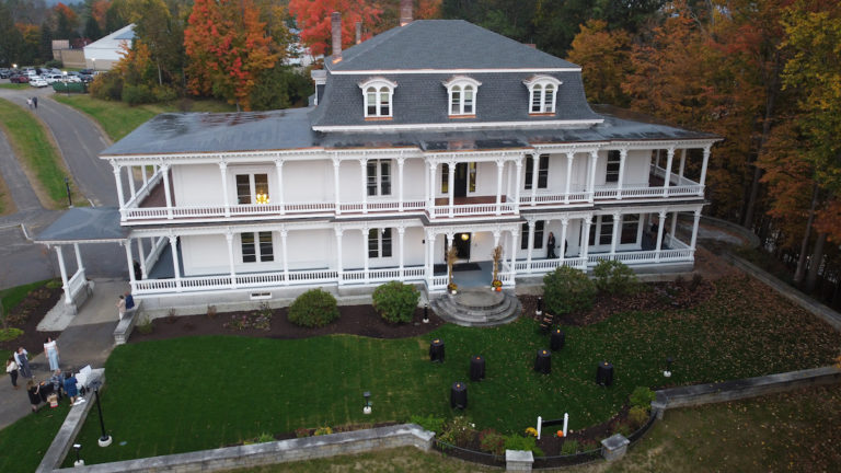 An aerial image of the Charles E. Tilton Mansion in the fall.