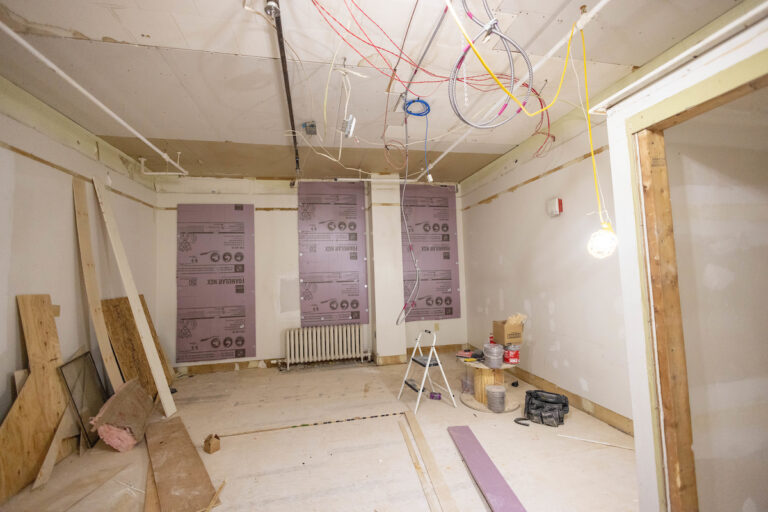 A dorm room in East Knowles is prepped for new window installation.